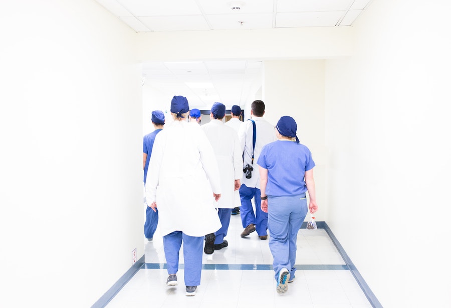 Doctors walking in hallway